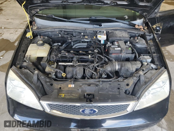 2007 Ford Focus S with VIN 1FAFP31N67W348464, listed as a Copart auction lot 49895615 with 122,026 mi miles and Non Repairable. Bid and sale history available at DreamBid. Image 11.