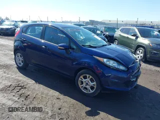 2016 Ford Fiesta SE z VIN 3FADP4EJ2GM185168, wystawiony jako IAAI lot #41141788 z przebiegiem 70 632 mil mil oraz . Historia ofert i sprzedaży dostępna na DreamBid. Obrazek 1.