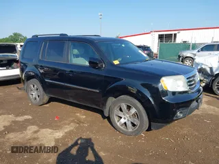 2013 Honda Pilot Touring z VIN 5FNYF4H96DB084148, wystawiony jako IAAI lot #42465066 z przebiegiem 220 339 mil mil oraz . Historia ofert i sprzedaży dostępna na DreamBid. Obrazek 1.