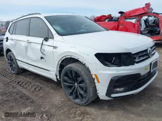 2020 Volkswagen Tiguan SE with VIN 3VV2B7AX4LM106638, listed as a IAAI auction lot 41744503 with 67,693 mi miles. Bid and sale history available at carsss.com. Image 1.
