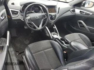 2013 Hyundai Veloster w/Gray Int z VIN KMHTC6AD3DU135296, wystawiony jako Copart lot #59778985 z przebiegiem 125 134 mil mil oraz Czysty tytuł • Clean title. Historia ofert i sprzedaży dostępna na DreamBid. Obrazek 8.