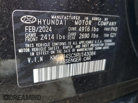 2024 Genesis G70 2.5T with VIN KMTG34SC5RU143084, listed as a Copart auction lot 49413075 with 12,447 mi miles and Clean title. Bid and sale history available at DreamBid. Image 12.
