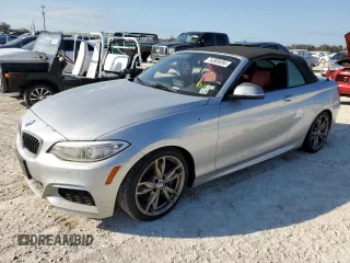 2015 BMW 2 Series M235i with VIN WBA1M1C52FVZ99476, listed as a Copart auction lot 74385694 with 0 mi miles and Salvage Title. Bid and sale history available at carsss.com. Image 1.