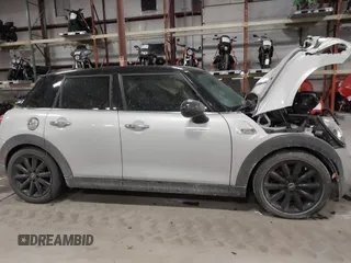 2015 MINI Hardtop 4 Door S with VIN WMWXU3C56F2B66449, listed as a IAAI auction lot 41296784 with 53,589 mi miles and . Bid and sale history available at DreamBid. Image 13.