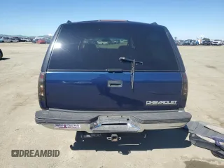 1999 Chevrolet Suburban with VIN 1GNEC16R1XJ394144, listed as a Copart auction lot 50418185 with 173,037 mi miles and Salvage title. Bid and sale history available at DreamBid. Image 6.
