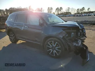 2020 Honda Pilot Touring 8-Passenger with VIN 5FNYF5H98LB007964, listed as a Copart auction lot 88583315 with 83,786 mi miles and Salvage Title. Bid and sale history available at DreamBid. Image 4.