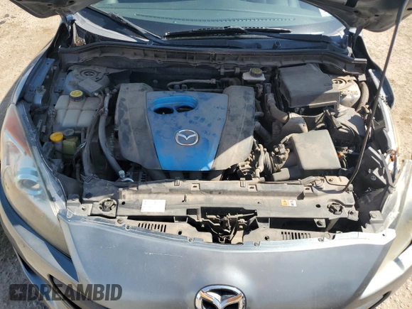 2012 Mazda 3 i Touring with VIN JM1BL1L7XC1534992, listed as a Copart auction lot 63142035 with 122,952 mi miles and Salvage title. Bid and sale history available at DreamBid. Image 11.