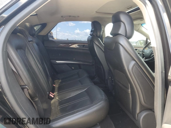 2014 Lincoln MKZ z VIN 3LN6L2GK3ER828065, wystawiony jako Copart lot #56925665 z przebiegiem 187 050 mil mil oraz Szkoda całkowita • Salvage title. Historia ofert i sprzedaży dostępna na DreamBid. Obrazek 10.