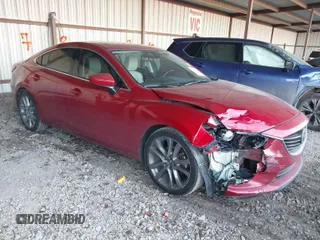 2014 Mazda 6 i Grand Touring with VIN JM1GJ1W62E1141859, listed as a IAAI auction lot 41242702 with 154,117 mi miles. Bid and sale history available at carsss.com. Image 1.