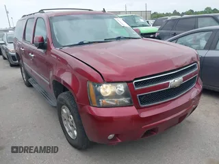 2011 Chevrolet Suburban LT z VIN 1GNSKJE39BR324274, wystawiony jako IAAI lot #42034184 z przebiegiem 209 737 mil mil oraz . Historia ofert i sprzedaży dostępna na DreamBid. Obrazek 1.