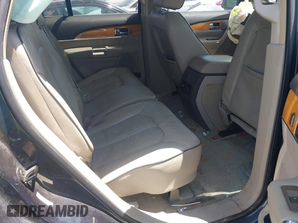 2014 Lincoln MKX with VIN 2LMDJ6JK8EBL13191, listed as a IAAI auction lot 42023811 with 212,793 mi miles. Bid and sale history available at carsss.com. Image 8.
