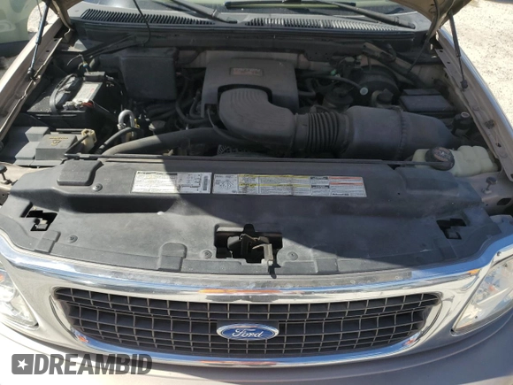 1997 Ford Expedition XLT with VIN 1FMEU17L7VLB84516, listed as a Copart auction lot 76664984 with 269,040 mi miles and Salvage title. Bid and sale history available at DreamBid. Image 11.