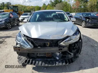 2017 Nissan Sentra SV z VIN 3N1AB7AP4HY295725, wystawiony jako Copart lot #56043405 z przebiegiem 71 564 mil mil oraz Szkoda całkowita • Salvage title. Historia ofert i sprzedaży dostępna na DreamBid. Obrazek 5.