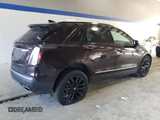 2021 Cadillac XT5 AWD Sport z VIN 1GYKNGRS5MZ165836, wystawiony jako Copart lot #77872264 z przebiegiem 46 065 mil mil oraz Szkoda całkowita • Salvage title. Historia ofert i sprzedaży dostępna na DreamBid. Obrazek 3.