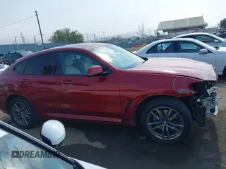 2021 BMW X4 xDrive30i with VIN 5UX2V1C09M9F29509, listed as a IAAI auction lot 42408605 with 46,992 mi miles and . Bid and sale history available at DreamBid. Image 14.