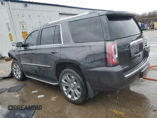 2016 GMC Yukon Denali with VIN 1GKS2CKJ4GR369125, listed as a Copart auction lot 49224914 with 149,356 mi miles and Salvage Title. Bid and sale history available at carsss.com. Image 2.