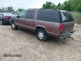 1996 Chevrolet Suburban z VIN 1GNFK16R8TJ397396, wystawiony jako IAAI lot #42367280 z przebiegiem 287 980 mil mil oraz . Historia ofert i sprzedaży dostępna na DreamBid. Obrazek 3.