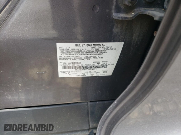 2014 Ford Taurus Limited with VIN 1FAHP2F84EG149622, listed as a Copart auction lot 63764675 with 208,801 mi miles and Salvage title. Bid and sale history available at DreamBid. Image 12.
