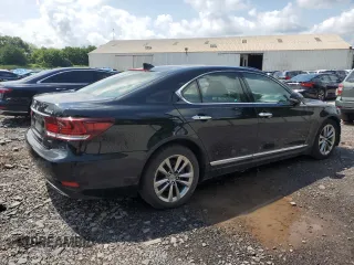 2015 Lexus LS 460 with VIN JTHCL5EF0F5025490, listed as a Copart auction lot 64000615 with 203,507 mi miles and Salvage title. Bid and sale history available at DreamBid. Image 3.