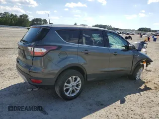2017 Ford Escape SE z VIN 1FMCU0GD2HUA57505, wystawiony jako Copart lot #54814185 z przebiegiem 121 540 mil mil oraz Szkoda całkowita • Salvage title. Historia ofert i sprzedaży dostępna na DreamBid. Obrazek 3.