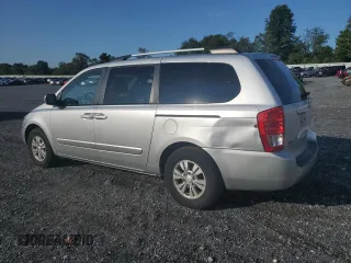 2012 Kia Sedona LX with VIN KNDMG4C78C6434391, listed as a Copart auction lot 70853574 with 127,359 mi miles and Salvage Title. Bid and sale history available at carsss.com. Image 2.