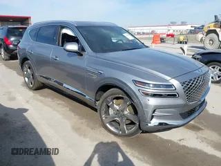 2023 Genesis GV80 with VIN KMUHCESCXPU128132, listed as a IAAI auction lot 41781980 with 14,697 mi miles. Bid and sale history available at carsss.com. Image 1.