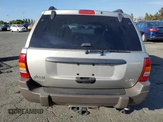 2003 Jeep Grand Cherokee with VIN 1J8GW48N43C593488, listed as a Copart auction lot 60466805 with 70,882 mi miles and Salvage title. Bid and sale history available at DreamBid. Image 6.