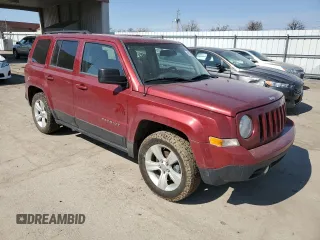 2015 Jeep Patriot Latitude with VIN 1C4NJPFB8FD264556, listed as a Copart auction lot 48775935 with 147,432 mi miles and Salvage Title. Bid and sale history available at DreamBid. Image 4.