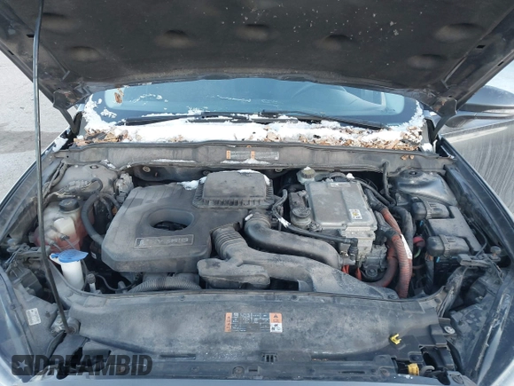 2015 Ford Fusion SE Hybrid with VIN 3FA6P0LU1FR219908, listed as a IAAI auction lot 41272688 with 310,452 mi miles. Bid and sale history available at carsss.com. Image 10.