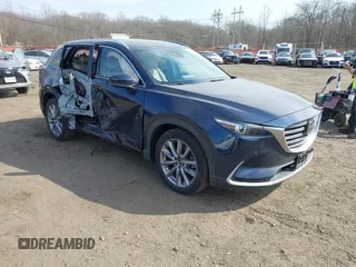 2021 Mazda CX-9 Grand Touring with VIN JM3TCBDY7M0540359, listed as a IAAI auction lot 41711366 with 47,391 mi miles and . Bid and sale history available at carsss.com. Image 1.