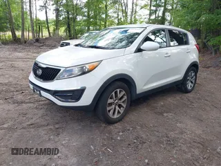 2016 Kia Sportage LX with VIN KNDPB3AC7G7819625, listed as a IAAI auction lot 42214385 with 141,339 mi miles. Bid and sale history available at carsss.com. Image 2.
