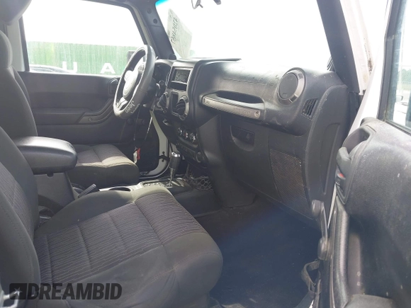2012 Jeep Wrangler Sport with VIN 1C4AJWAG4CL214606, listed as a IAAI auction lot 42054857 with Not provided miles and . Bid and sale history available at DreamBid. Image 5.