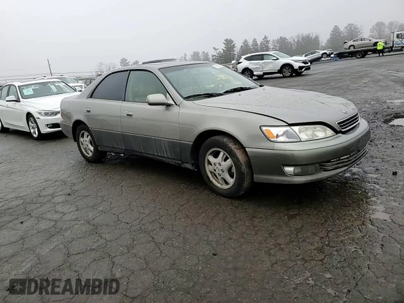 2000 Lexus ES 300 with VIN JT8BF28GXY5091263, listed as a Copart auction lot 61767595 with 250,041 mi miles and Salvage title. Bid and sale history available at DreamBid. Image 10.
