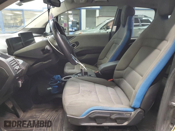 2017 BMW i3 z VIN WBY1Z8C3XHV890664, wystawiony jako Copart lot #44791935 z przebiegiem 97 864 mil mil oraz Szkody całkowita. Historia ofert i sprzedaży dostępna na DreamBid. Obrazek 7.