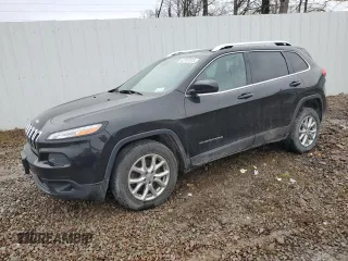 2015 Jeep Cherokee Latitude with VIN 1C4PJMCBXFW504433, listed as a Copart auction lot 52767515 with 141,969 mi miles and Clean Title. Bid and sale history available at carsss.com. Image 1.