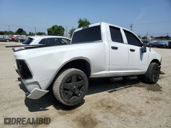 2014 Ram 1500 Express with VIN 1C6RR7FT9ES177804, listed as a Copart auction lot 61002585 with 213,442 mi miles and Salvage title. Bid and sale history available at DreamBid. Image 3.