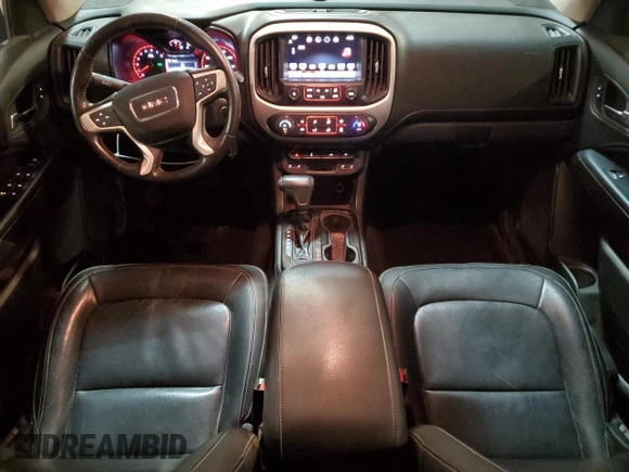 2016 GMC Canyon 2WD SLT with VIN 1GTG5DE39G1100516, listed as a Copart auction lot 87648455 with 243,815 mi miles and Salvage Title. Bid and sale history available at carsss.com. Image 8.