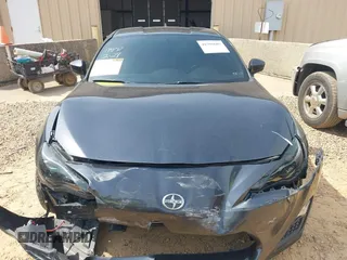 2016 Scion FR-S with VIN JF1ZNAA13G9702833, listed as a IAAI auction lot 41795687 with 71,161 mi miles and . Bid and sale history available at carsss.com. Image 13.