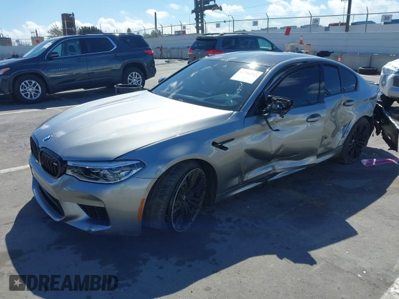 2020 BMW M5 Competition z VIN WBSJF0C05LB448878, wystawiony jako IAAI lot #41796245 z przebiegiem 62 856 mil mil oraz . Historia ofert i sprzedaży dostępna na DreamBid. Obrazek 16.