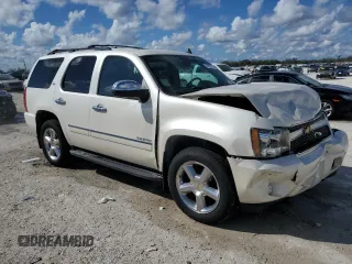 2012 Chevrolet Tahoe LTZ with VIN 1GNSCCE08CR214560, listed as a Copart auction lot 44723175 with 137,489 mi miles and Salvage title. Bid and sale history available at DreamBid. Image 4.