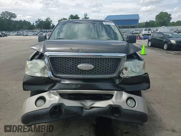 2007 Ford F-150 XLT with VIN 1FTPW14V77KD25879, listed as a Copart auction lot 58498505 with 177,059 mi miles and Salvage title. Bid and sale history available at DreamBid. Image 13.