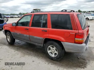 1997 Jeep Grand Cherokee Laredo with VIN 1J4GZ58S3VC770085, listed as a Copart auction lot 57584684 with 0 mi miles and Clean Title. Bid and sale history available at carsss.com. Image 2.