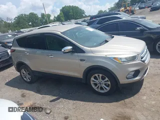 2017 Ford Escape SE with VIN 1FMCU0GD4HUE85348, listed as a IAAI auction lot 42135485 with 124,608 mi miles. Bid and sale history available at carsss.com. Image 13.