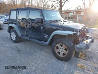 2012 Jeep Wrangler Unlimited Sport z VIN 1C4BJWDG9CL138994, wystawiony jako IAAI lot #41380663 z przebiegiem 215 344 mil mil oraz . Historia ofert i sprzedaży dostępna na DreamBid. Obrazek 1.