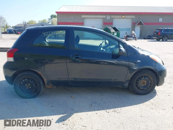 2010 Toyota Yaris z VIN JTDJT4K39A5292536, wystawiony jako IAAI lot #42229412 z przebiegiem 152 195 mil mil oraz . Historia ofert i sprzedaży dostępna na DreamBid. Obrazek 14.