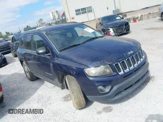 2014 Jeep Compass Sport with VIN 1C4NJCBA4ED594103, listed as a IAAI auction lot 42035379 with 127,161 mi miles. Bid and sale history available at carsss.com. Image 1.