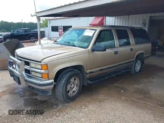 1999 Chevrolet Suburban with VIN 1GNFK16RXXJ416360, listed as a IAAI auction lot 42670294 with 319,691 mi miles and . Bid and sale history available at DreamBid. Image 2.