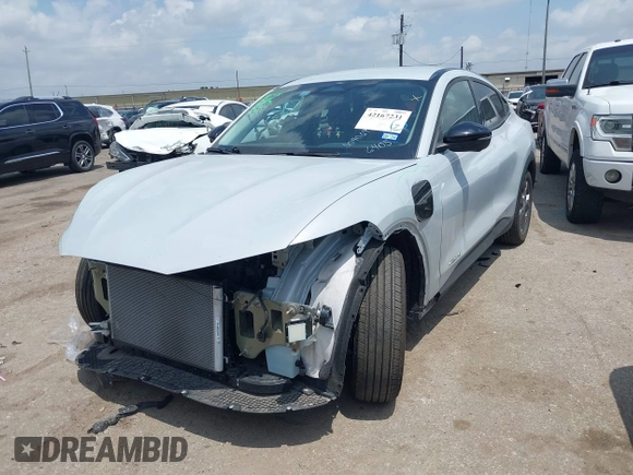 2023 Ford Mustang Mach-E Select z VIN 3FMTK1R40PMA76405, wystawiony jako IAAI lot #42167231 z przebiegiem 16 927 mil mil oraz . Historia ofert i sprzedaży dostępna na DreamBid. Obrazek 16.