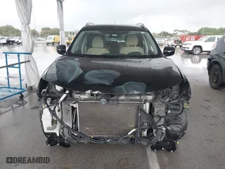 2015 Nissan Rogue S with VIN KNMAT2MT5FP502160, listed as a IAAI auction lot 41947071 with 112,056 mi miles. Bid and sale history available at carsss.com. Image 12.