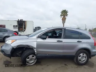 2007 Honda CR-V LX with VIN JHLRE38397C020722, listed as a IAAI auction lot 42100516 with 161,561 mi miles. Bid and sale history available at carsss.com. Image 14.